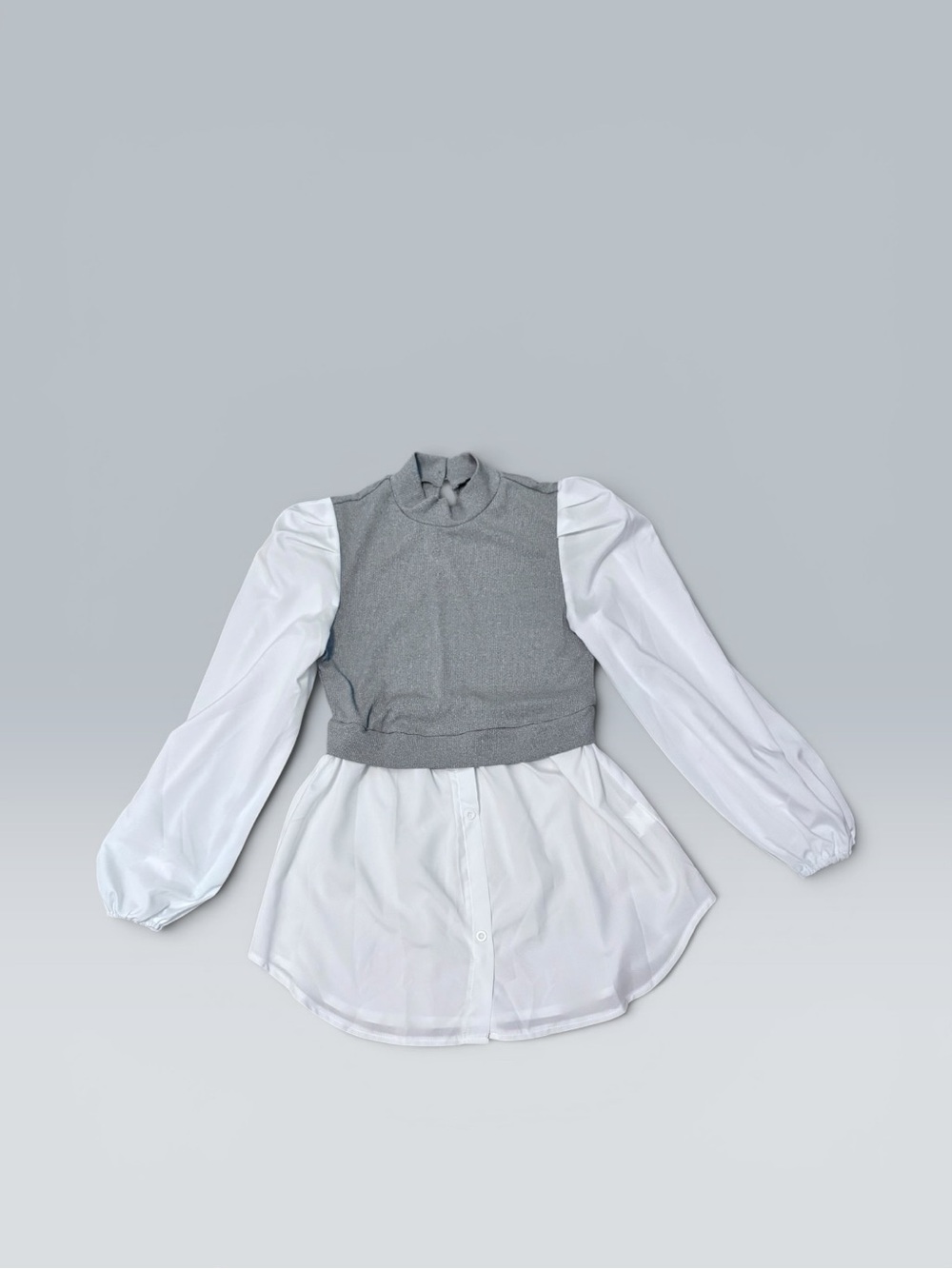 Cropped Gray Knit Vest Over White Button-Front Blouse